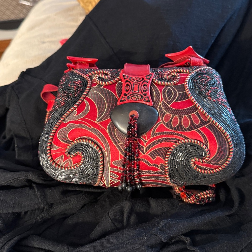 Mary Frances Red and Black Beaded shoulder bag
With beaded shoulder strap
